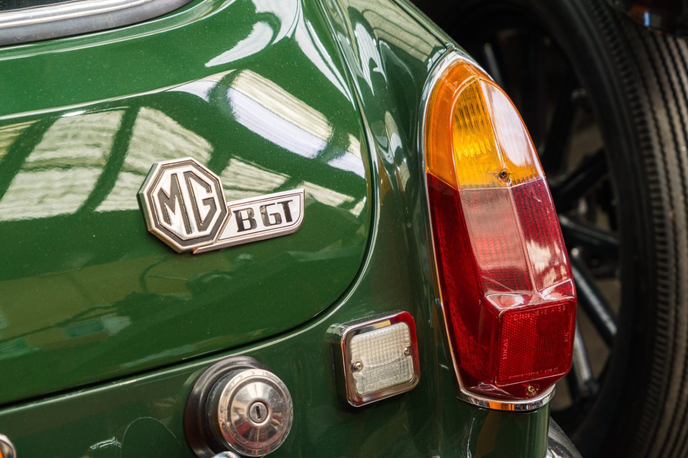 Deep-polished paintwork and chrome on a classic MG BGT after a full exterior detail