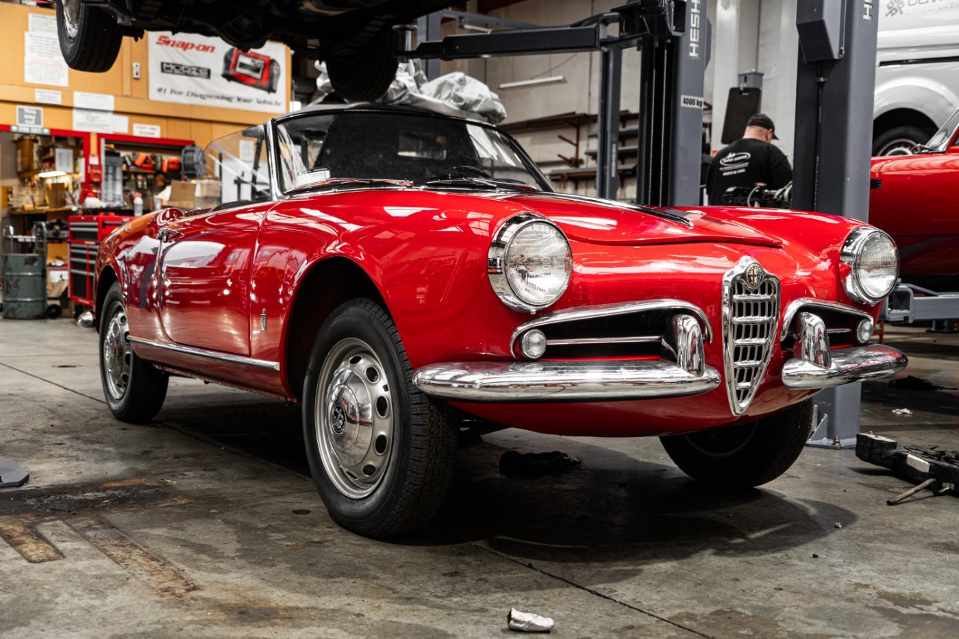 A classic Alfa Romeo Spider detailed and gleaming in the Kapiti workshop